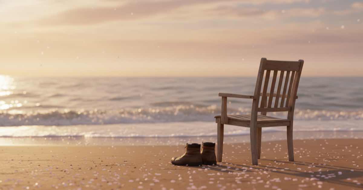 Contemplative seaside moment with empty chair at golden hour